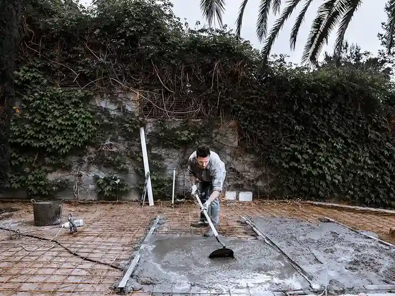a-worker-scatters-the-cement-with-a-shovel-2023-11-27-05-27-44-utc_4_11zon_14_11zon a-worker-scatters-the-cement-with-a-shovel-2023-11-27-05-27-44-utc_4_11zon_14_11zon